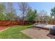 Large backyard deck with pergola, gravel, lawn, and seating area, perfect for entertaining or relaxing at 291 W Sycamore Ln, Louisville, CO 80027