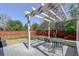 Backyard deck with a pergola, a dining table, and built-in seating, perfect for outdoor gatherings at 291 W Sycamore Ln, Louisville, CO 80027