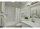 All white bathroom with shower and tub combination at 291 W Sycamore Ln, Louisville, CO 80027