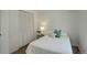 A bright bedroom with hardwood floors, a large closet and white walls at 291 W Sycamore Ln, Louisville, CO 80027