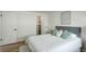 Bright bedroom with hardwood floors and closet at 291 W Sycamore Ln, Louisville, CO 80027