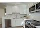 Modern kitchen with stainless steel appliances and white cabinets at 291 W Sycamore Ln, Louisville, CO 80027