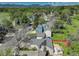 Picturesque neighborhood view with well-maintained homes, lush greenery, and stunning mountain views in the distance at 291 W Sycamore Ln, Louisville, CO 80027