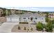 Charming home featuring a two-car garage and landscaped front yard, with a walkway leading to the front door at 1553 Plowman Dr, Monument, CO 80132