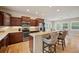 Modern kitchen featuring granite countertops, stainless steel appliances, and a breakfast bar with seating at 1553 Plowman Dr, Monument, CO 80132
