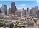 Expansive city view showcasing Denver's impressive skyscrapers with mountain views in the distance at 2524 Champa St # 1, Denver, CO 80205