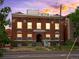 Attractive three-story red brick building with large windows, architectural details and convenient street access at 2524 Champa St # 1, Denver, CO 80205