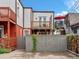 Rear exterior with balconies overlooking the yard at 2524 Champa St # 1, Denver, CO 80205