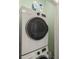 Modern, white, front-load washer and dryer set, providing convenience and efficiency at 2524 Champa St # 1, Denver, CO 80205