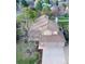 Aerial view of a two-story home and its surrounding landscaped yard at 1431 Beacon Hill Dr, Highlands Ranch, CO 80126