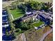 Stunning aerial view of an estate featuring lush landscaping and beautiful architecture on a sprawling property at 1431 Beacon Hill Dr, Highlands Ranch, CO 80126