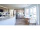 Bright kitchen with stainless steel appliances, center island, and adjacent dining area at 1431 Beacon Hill Dr, Highlands Ranch, CO 80126