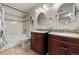 Spacious bathroom features double sinks and a shower over tub at 9944 E Carolina Cir # 201, Aurora, CO 80247