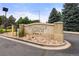 Pinnacle Ranch community sign with beautiful landscaping and rocks at 9944 E Carolina Cir # 201, Aurora, CO 80247