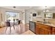 Charming kitchen features granite countertops, stainless steel appliances and eating space at 9944 E Carolina Cir # 201, Aurora, CO 80247