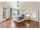 Cozy main bedroom features a large window and private door to the outside at 9944 E Carolina Cir # 201, Aurora, CO 80247