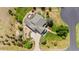 Aerial view showcasing manicured lawn, mature trees, and a private backyard with a hot tub at 12665 S Robinson Ranch Ct, Parker, CO 80134