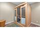 Modern sauna room featuring a wooden sauna with glass doors and a small wicker basket at 12665 S Robinson Ranch Ct, Parker, CO 80134