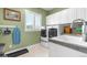 Functional laundry room with modern washer and dryer, ample counter space, and natural light at 12665 S Robinson Ranch Ct, Parker, CO 80134