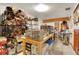 Large hobby room featuring storage for leather, tools, and sewing equipment at 30122 Nancys Ln, Conifer, CO 80433
