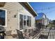Inviting back deck featuring patio furniture and string lights, perfect for outdoor relaxation at 5271 Routt Ct, Arvada, CO 80002