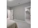 Bright bedroom with walk-in closet, neutral paint, and plush carpeting at 5271 Routt Ct, Arvada, CO 80002