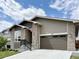 Charming single-Gathering home with brick accents, well-manicured lawn, and a two-car garage, creating excellent curb appeal at 5271 Routt Ct, Arvada, CO 80002