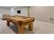 Inviting game room features a billiard table and a comfortable seating area at 5271 Routt Ct, Arvada, CO 80002