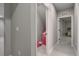 Hallway with linen closet, neutral paint, and plush carpeting at 5271 Routt Ct, Arvada, CO 80002