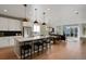 Open concept living room with direct view to dining room and kitchen at 5271 Routt Ct, Arvada, CO 80002