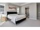 Main bedroom with carpeted floor, large windows and ensuite bathroom at 5271 Routt Ct, Arvada, CO 80002