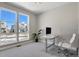 Bright office space with large windows and modern desk setup, perfect for working from home at 5271 Routt Ct, Arvada, CO 80002