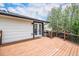 Large back deck with double doors for easy access to the house at 6775 Newland St, Arvada, CO 80003