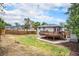 Expansive backyard with privacy fence, shed, deck and mature trees at 6775 Newland St, Arvada, CO 80003