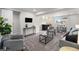 Finished basement featuring gray carpet, neutral walls, and a bar area at 6775 Newland St, Arvada, CO 80003