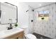 Stylish bathroom features a modern sink, mosaic shower tiles and great fixtures at 6775 Newland St, Arvada, CO 80003
