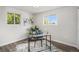 Inviting home office space with natural light, stylish décor, and hardwood flooring at 6775 Newland St, Arvada, CO 80003