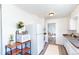 Well-lit kitchen featuring modern appliances and ample countertop space at 9100 Yucca Way, Thornton, CO 80229