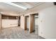 Finished basement features neutral carpeting and access to additional storage space at 827 S Sherman St, Denver, CO 80209