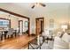 Open-concept living space featuring hardwood floors, a dining area, and comfortable seating at 827 S Sherman St, Denver, CO 80209