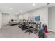 Finished basement with gaming setup and carpet at 7391 S Marion St, Centennial, CO 80122