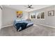 Inviting bedroom with a ceiling fan, closet, and windows at 7391 S Marion St, Centennial, CO 80122