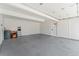 Clean and organized garage with epoxy flooring at 7391 S Marion St, Centennial, CO 80122