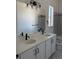 Contemporary bathroom with dual sinks, modern fixtures, and ample counter space at 901 Coal Bank Trl, Castle Rock, CO 80104