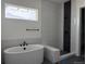 Luxurious bathroom with a modern soaking tub, and a tiled walk-in shower with black fixtures at 901 Coal Bank Trl, Castle Rock, CO 80104