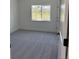 Light filled bedroom with neutral carpet and outdoor view at 901 Coal Bank Trl, Castle Rock, CO 80104