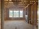 Framing of future living space showcasing three windows and modern fireplace feature at 901 Coal Bank Trl, Castle Rock, CO 80104