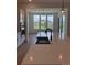 Open kitchen with a stylish sink and stainless steel appliances, and large windows offering abundant natural light at 901 Coal Bank Trl, Castle Rock, CO 80104