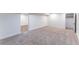 Expansive carpeted bedroom with neutral colors, bright light, and crisp white trim at 8271 Bluebell Way, Denver, CO 80221