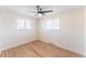 Bright bedroom features hardwood floors, and ceiling fan with light at 8271 Bluebell Way, Denver, CO 80221
